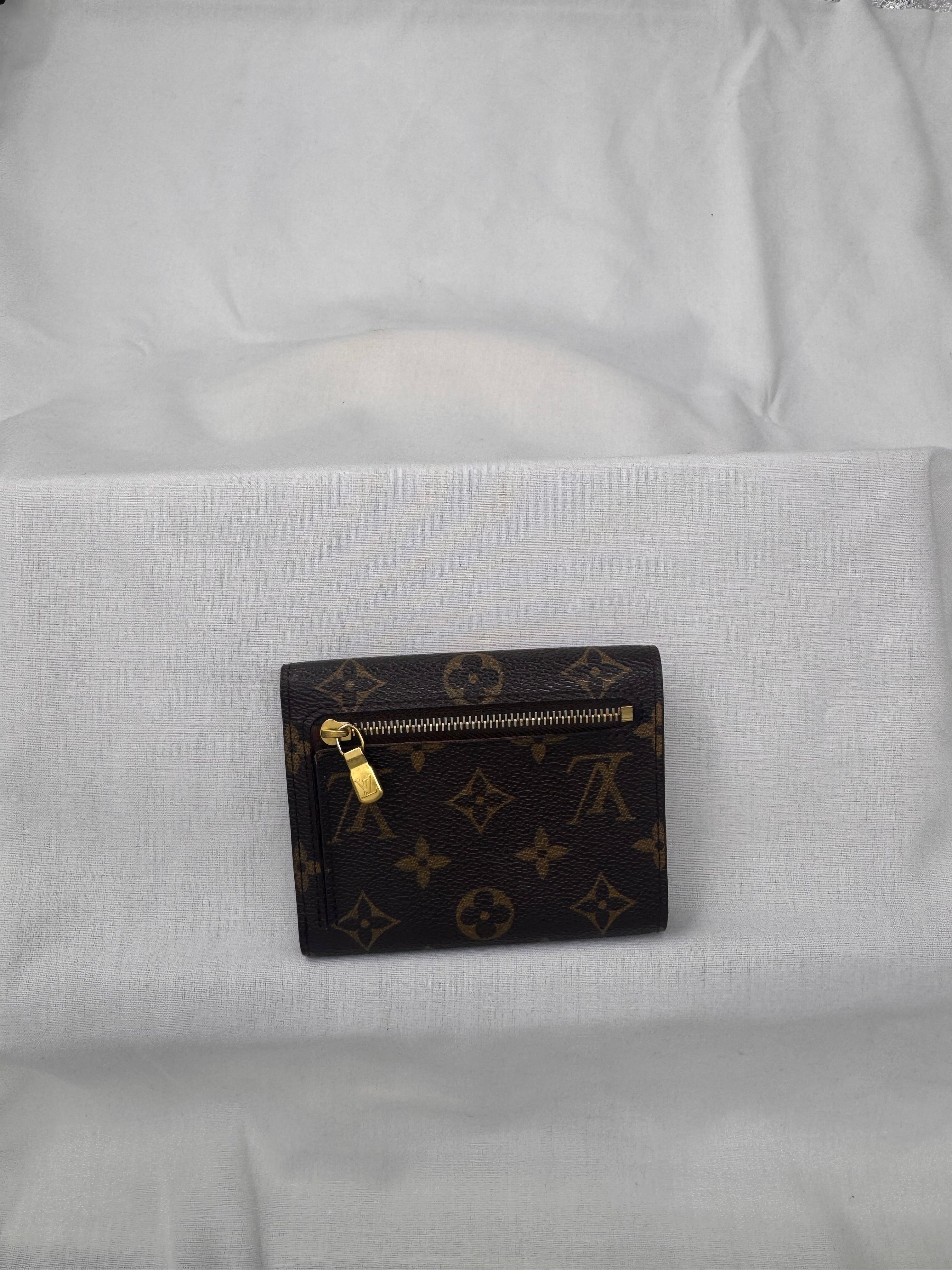 ארנק לואי ויטון קלאסי מקנבס מונוגרם עם אבזם מוזהב – מהדורת וינטג' יוקרתית